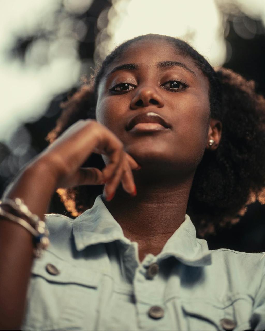 portrait of beautiful young woman outside