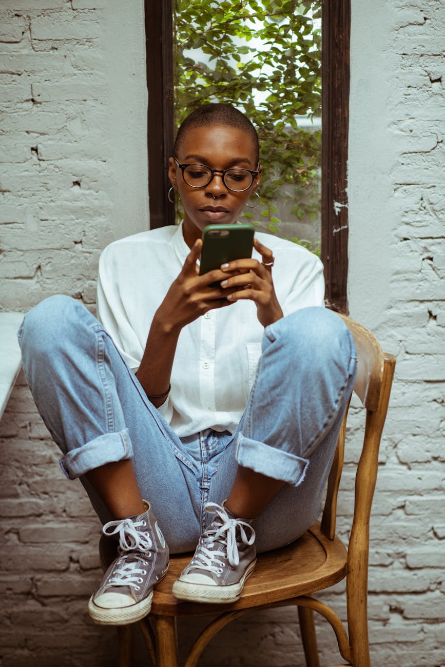 serious woman using smartphone