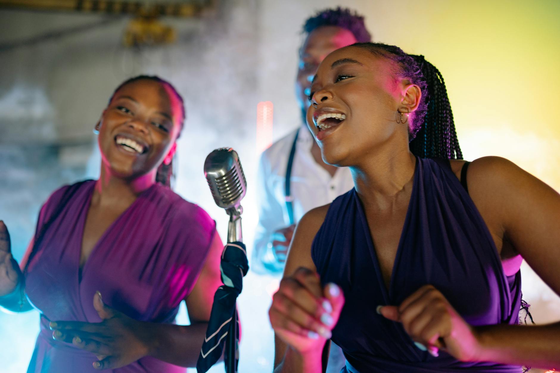 women singing together