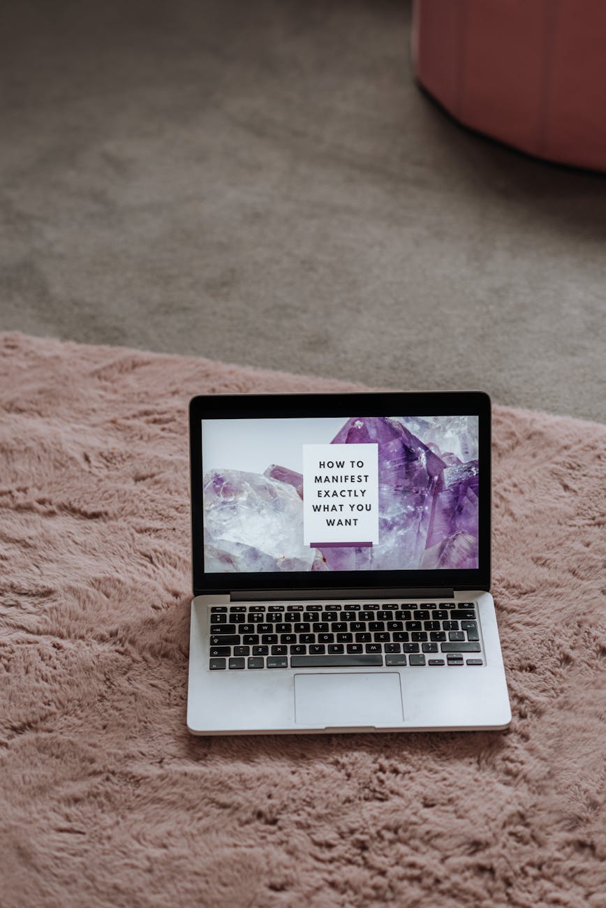 laptop with inspirational words on screen