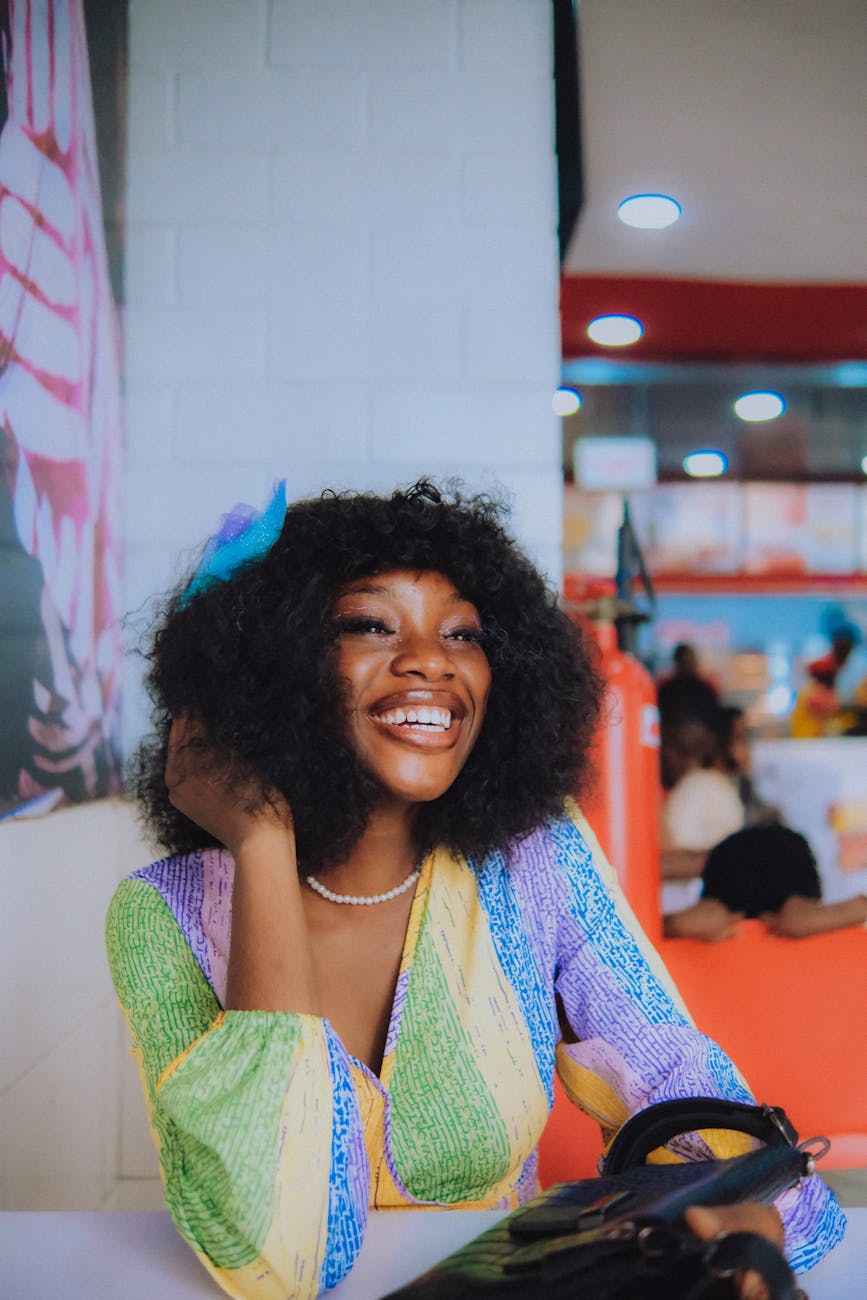 joyful woman in vibrant restaurant setting